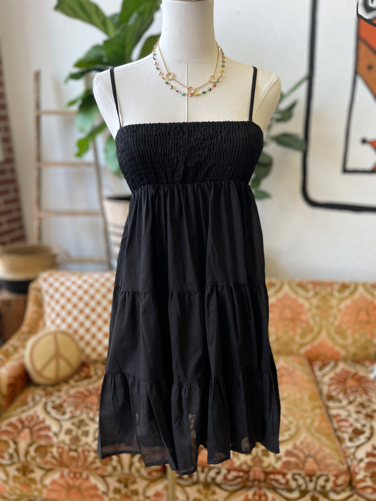 Cotton Smocked Tiered Mini Dress in Black