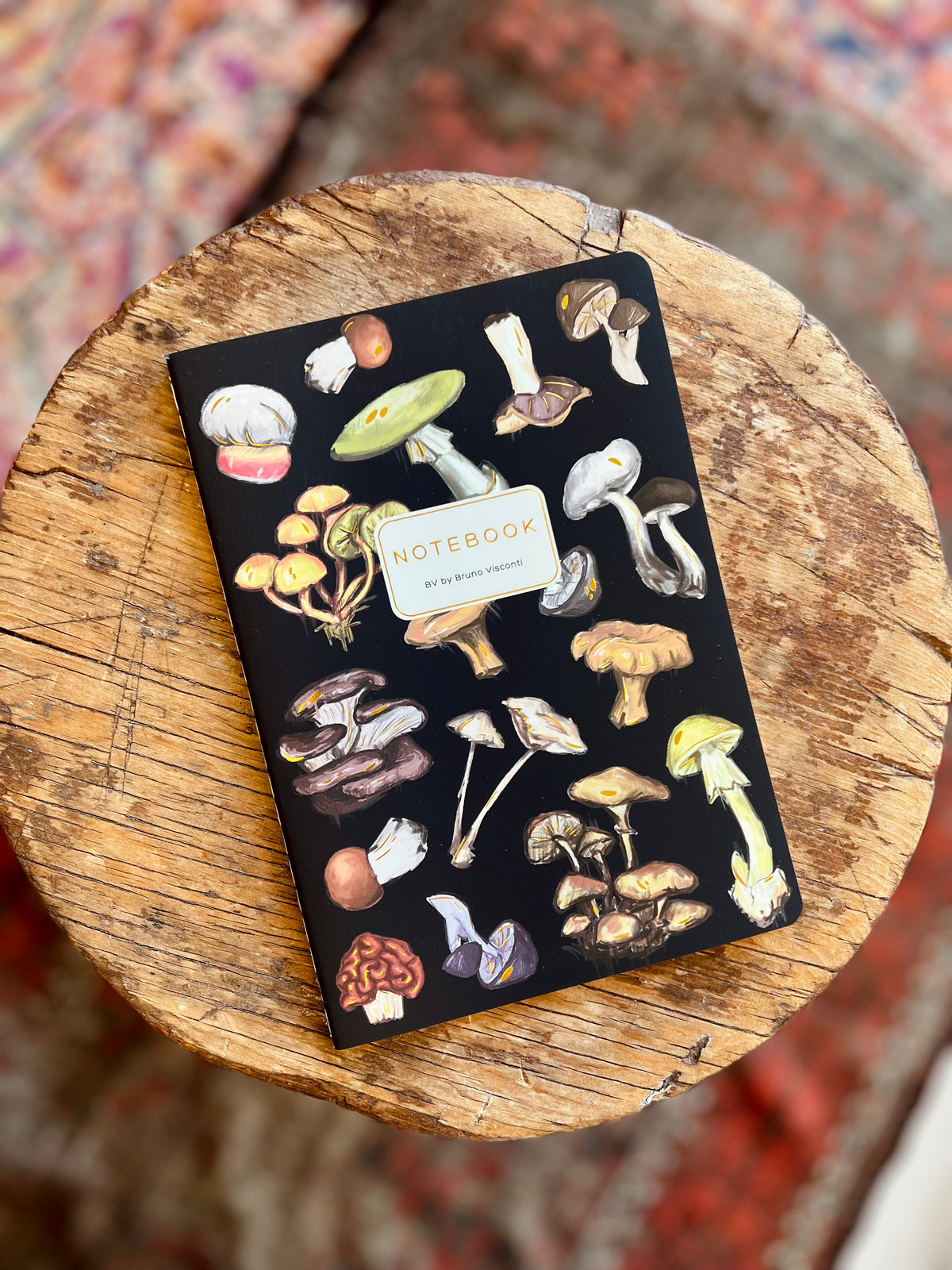Mushrooms on Black Notebook