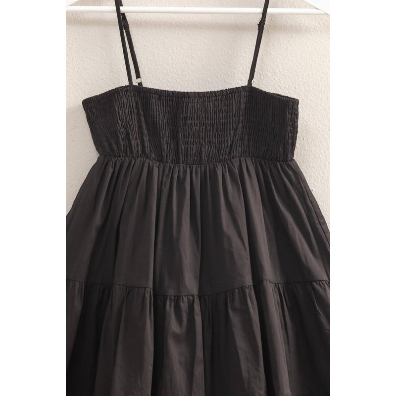 Cotton Smocked Tiered Mini Dress in Black