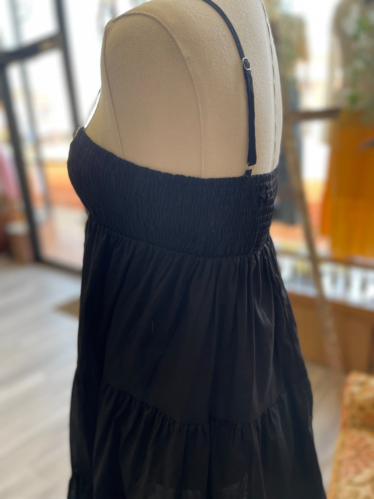 Cotton Smocked Tiered Mini Dress in Black