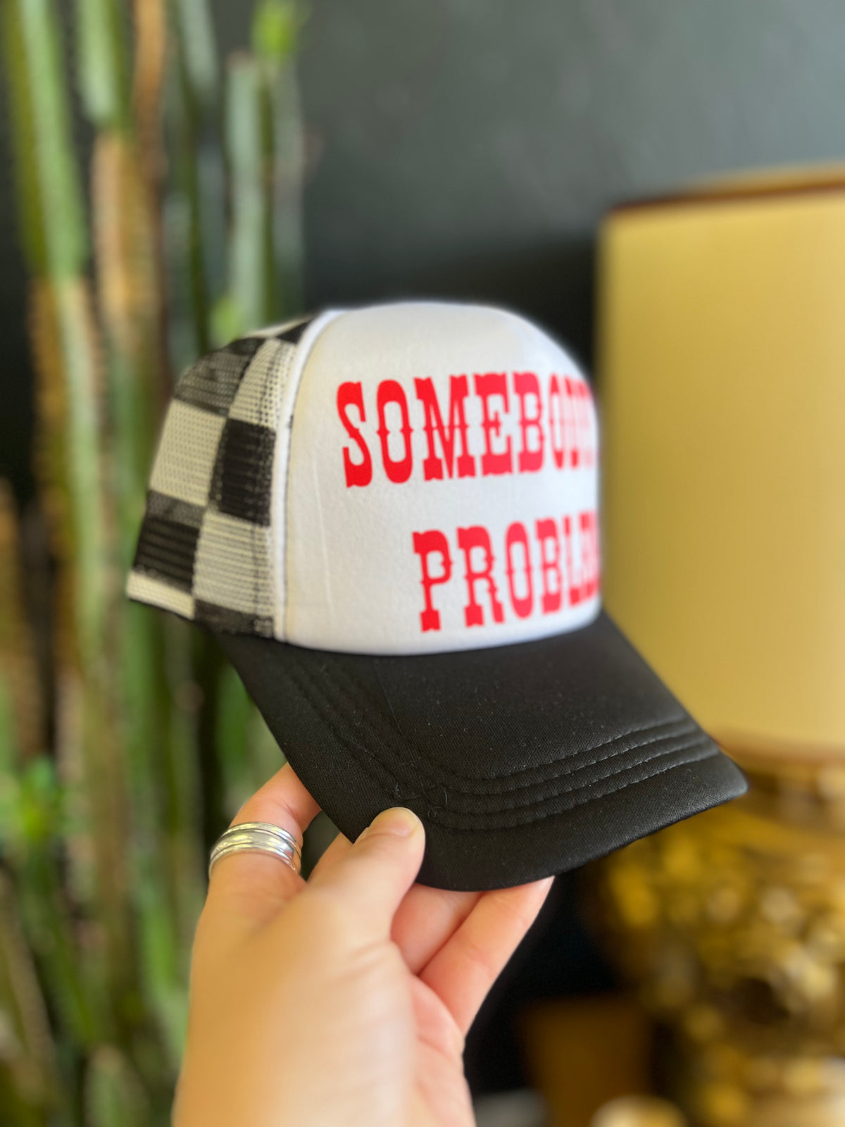 Somebody's Problem Checkered Trucker Hat