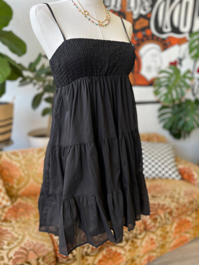 Cotton Smocked Tiered Mini Dress in Black